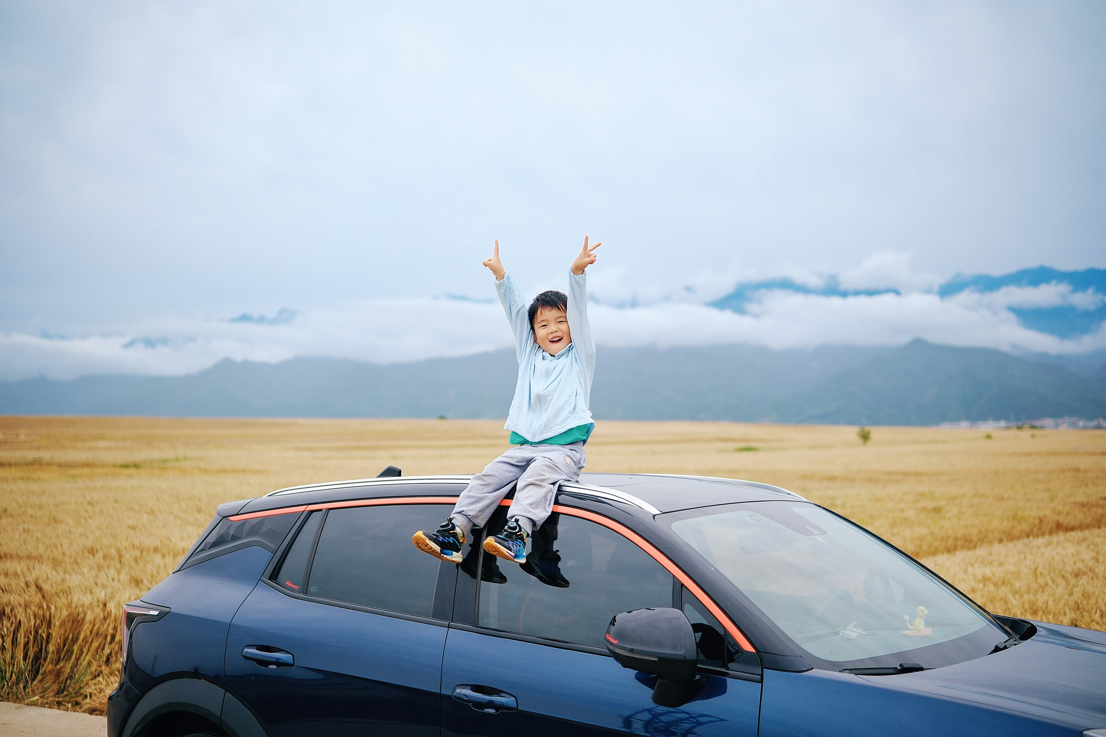 Zenvo vehicle in an open landscape with mountains